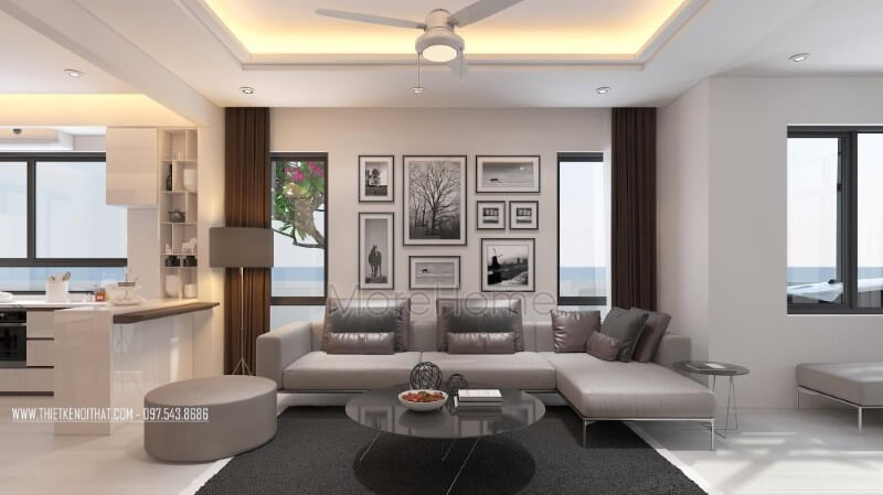 Chất liệu da sáng bóng cao cấp với tone xám tinh tế của thiết kế sofa góc hiện đại nổi bật giữa không gian phòng khách biệt thự, nhà phố Thiết kế phòng khách biệt thự