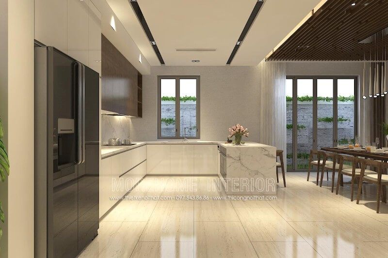 Màu trắng của tủ bếp gỗ Acrylic kết hợp với màu nâu đậm của gỗ Veneer óc chó tạo nên sự hiện đại tinh tế cho không gian bếp